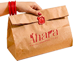 Ahara's branded paper delivery bag, sealed and ready to go