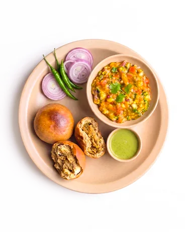 Regular Thali with 2 littis, baingan bharta, chutney and onion salad